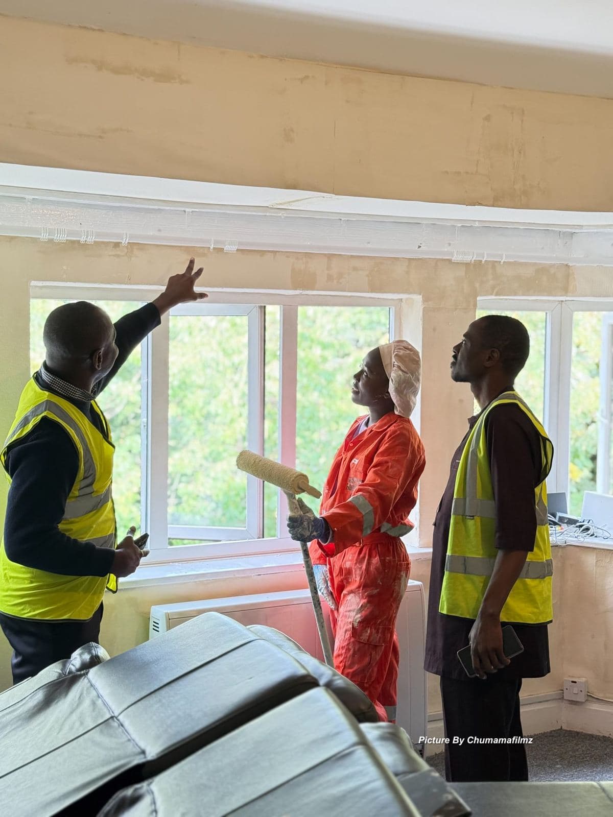 Site survey with a homeowner and two surveyors